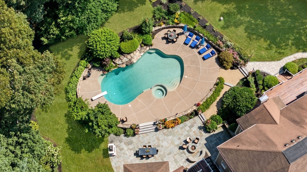 137 Lake Street Sherborn, MA 01770 - Photo 40 of 42 an aerial view of a house with a yard and large trees