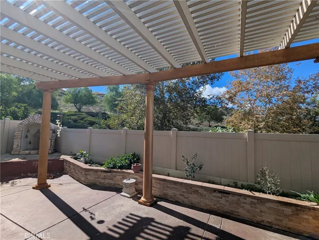 a view of a porch with furniture