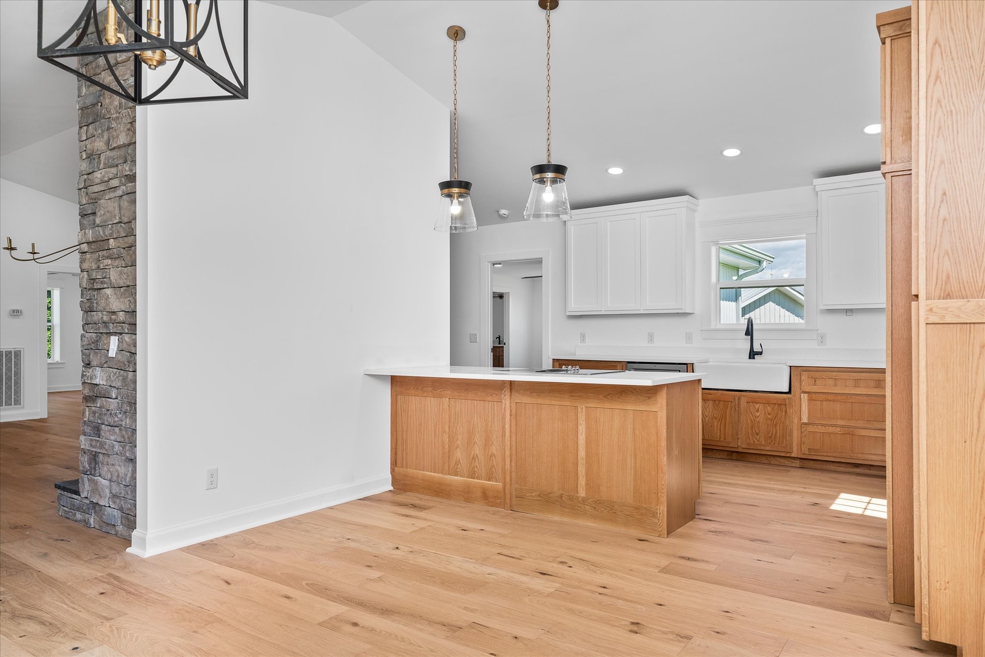 806 Robinson Ridge Road Baxter, TN 38544 - Photo 12 of 36 a large kitchen with kitchen island a sink stainless steel appliances and cabinets