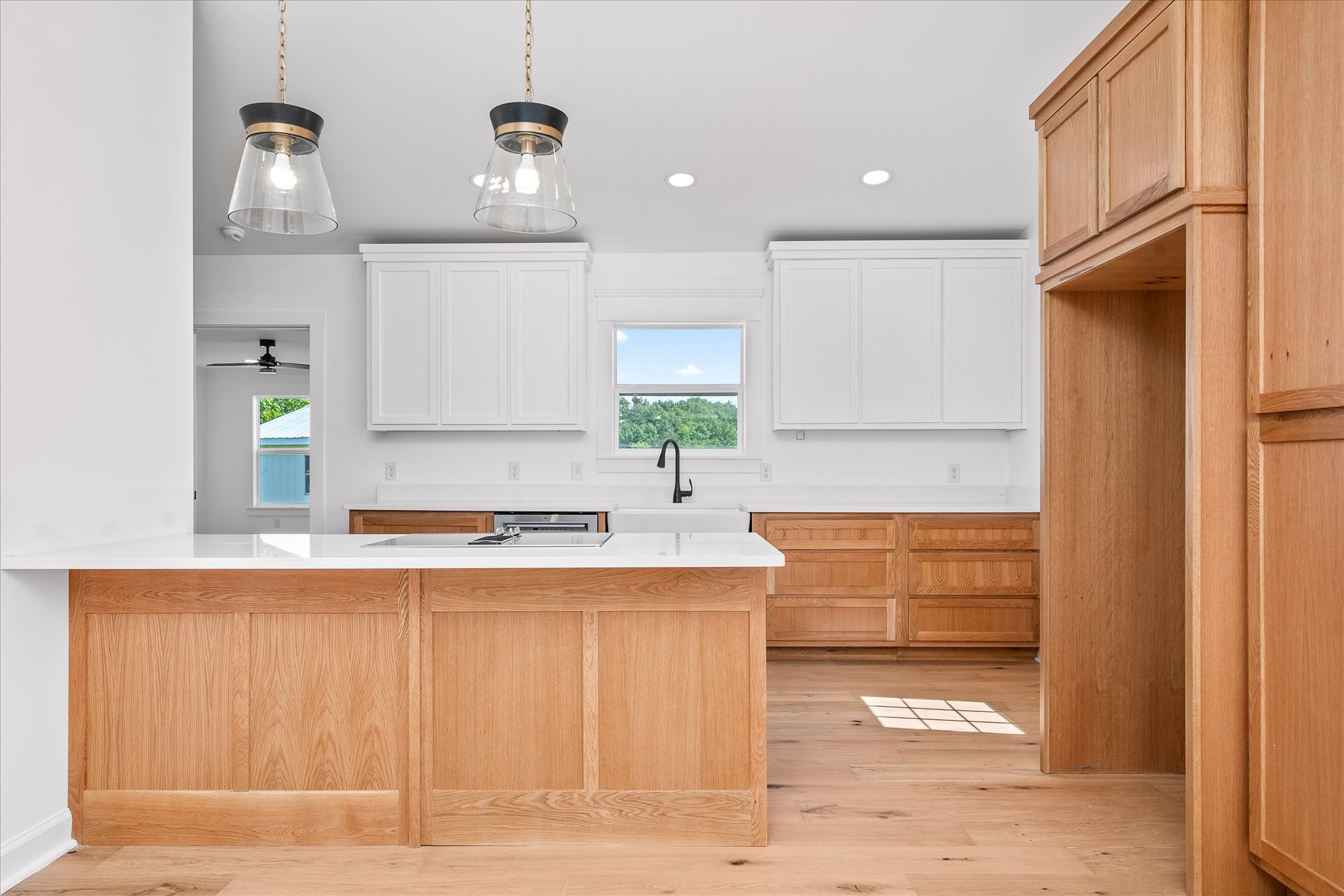 806 Robinson Ridge Road Baxter, TN 38544 - Photo 13 of 36 a kitchen with stainless steel appliances a sink stove and cabinets