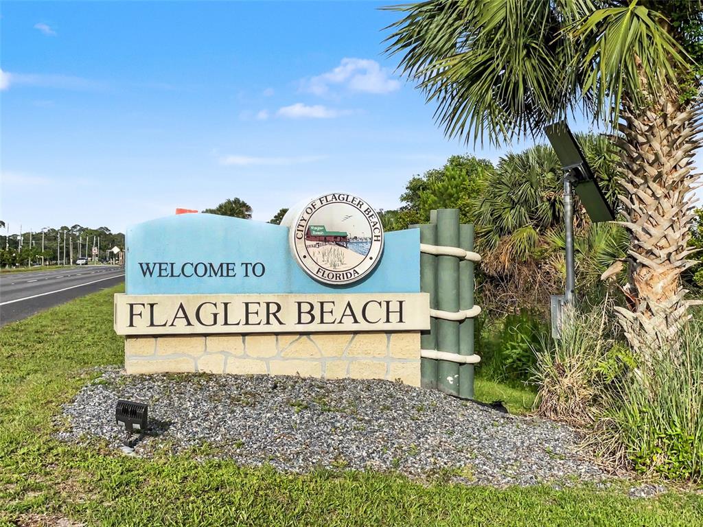 55 Signet Circle Flagler Beach, FL 32136 - Photo 38 of 39 a sign that is on a brick wall