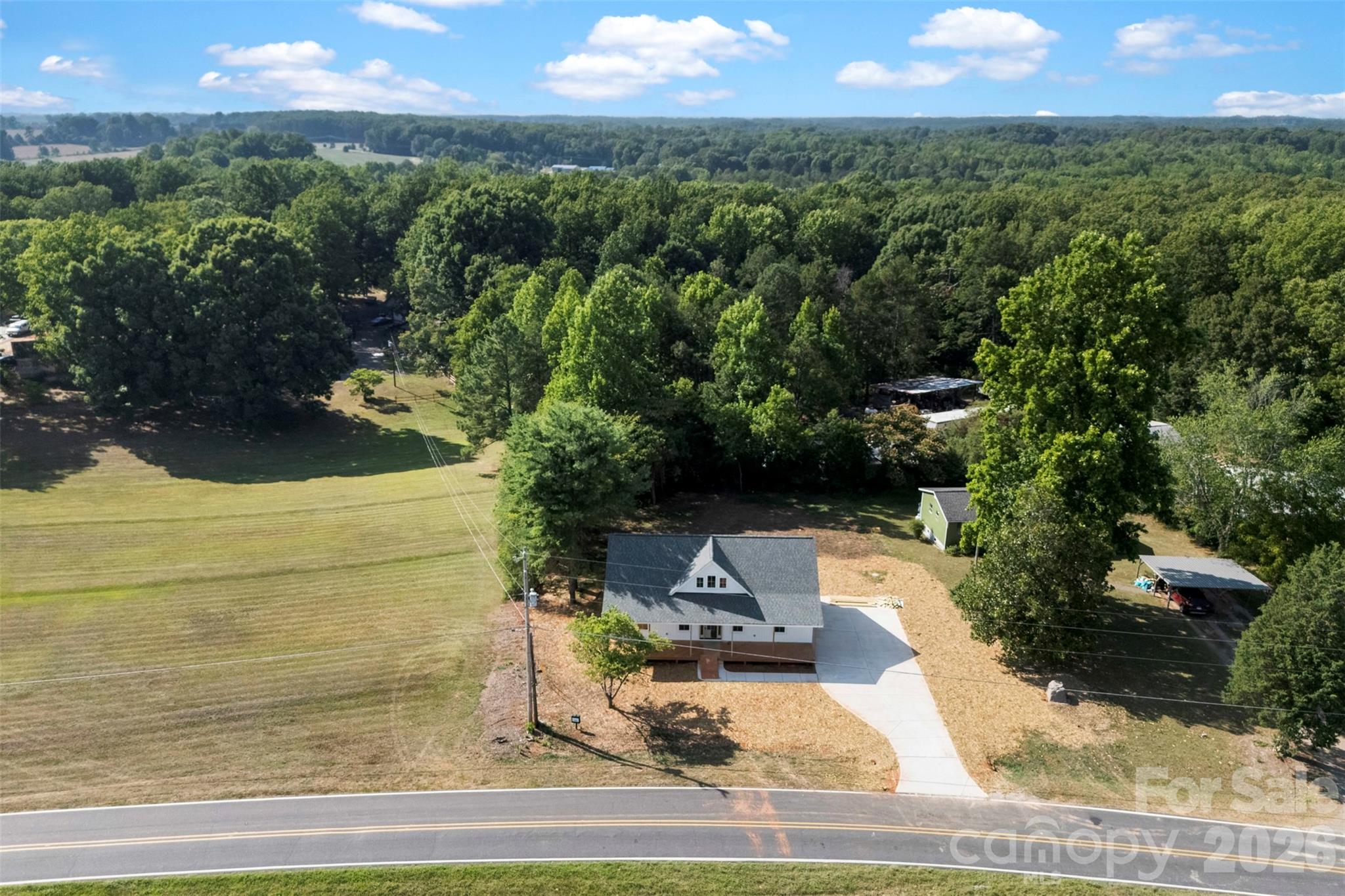 719 Chestnut Ridge Church Road Kings Mountain, NC 28086 - Photo 4 of 4 a view of a yard with an outdoor space
