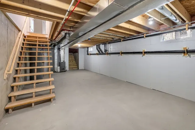 a view of an empty room with a windows