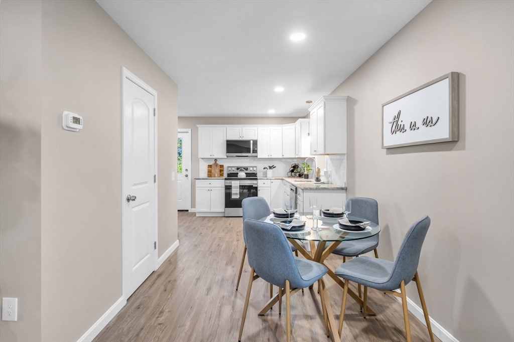 121-123 Putnam Circle Springfield, MA 01104 - Photo 2 of 18 a view of a dining room with furniture