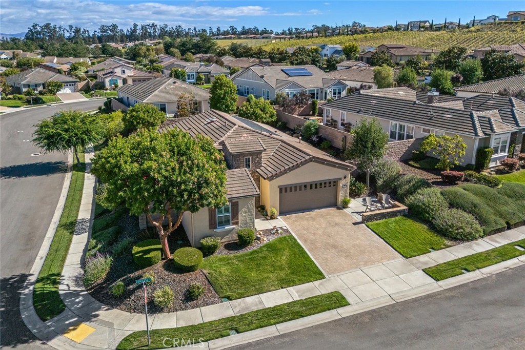 1147 Contessa Way Nipomo, CA 93444 - Photo 34 of 57 an aerial view of a house with a yard