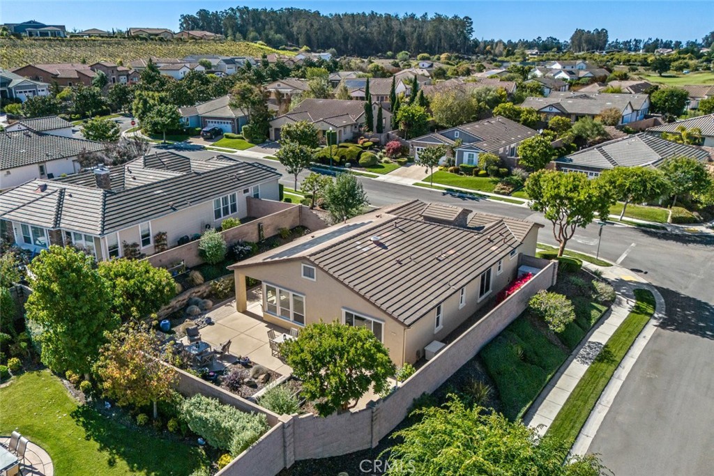 1147 Contessa Way Nipomo, CA 93444 - Photo 35 of 57 an aerial view of a house with a garden and lake view