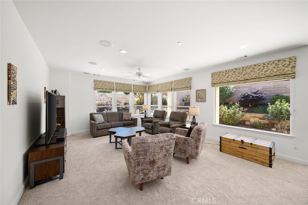 1147 Contessa Way Nipomo, CA 93444 - Photo 6 of 57 a living room with furniture and a flat screen tv