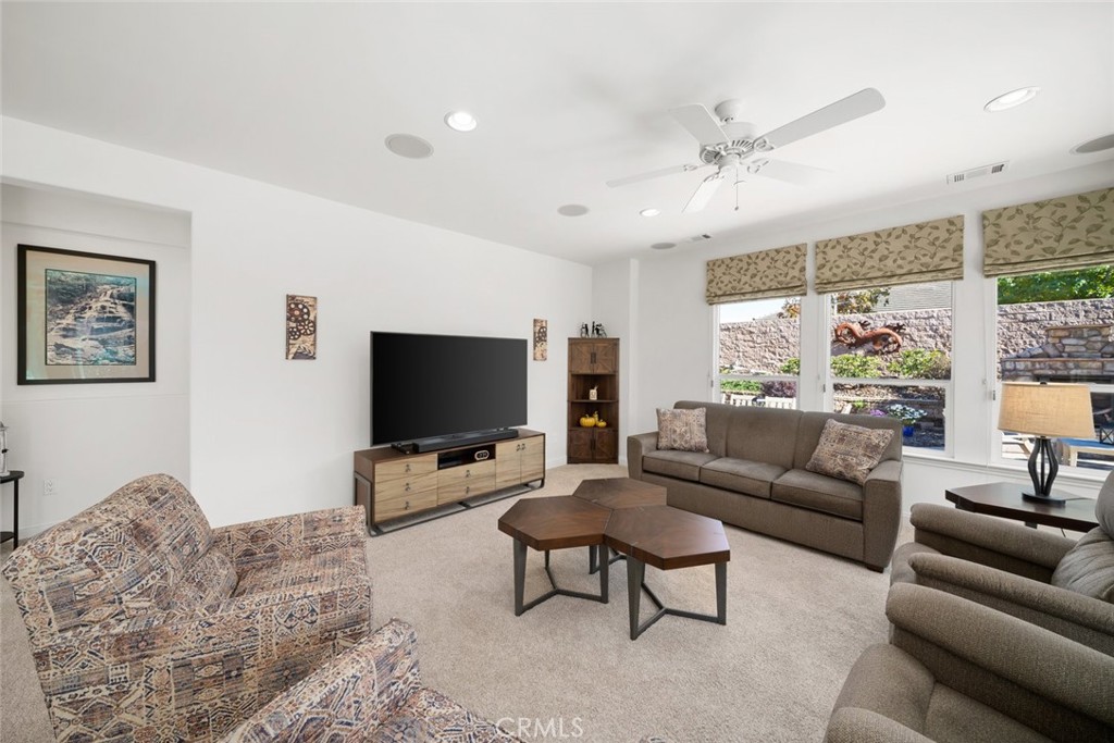 1147 Contessa Way Nipomo, CA 93444 - Photo 7 of 57 a living room with furniture and a flat screen tv