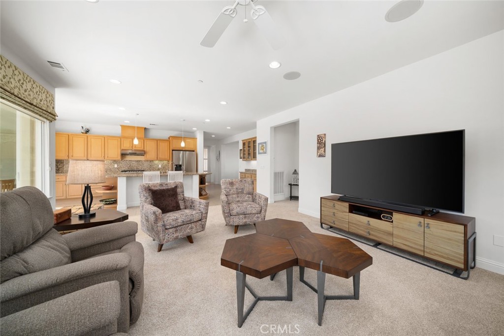 1147 Contessa Way Nipomo, CA 93444 - Photo 8 of 57 a living room with furniture and a flat screen tv