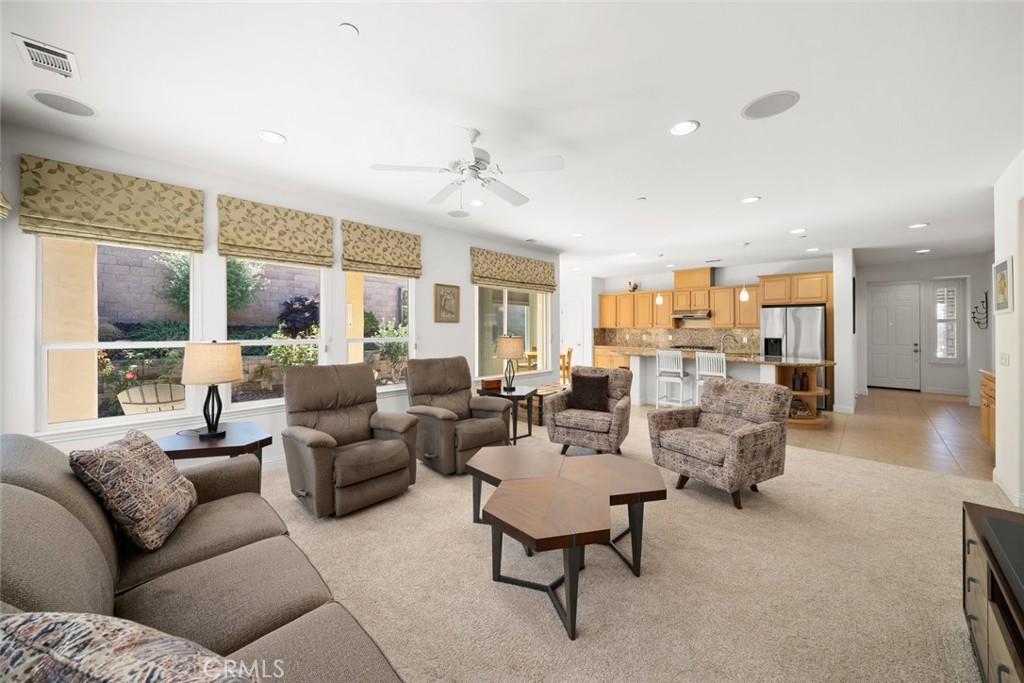 1147 Contessa Way Nipomo, CA 93444 - Photo 9 of 57 a living room with furniture and a large window