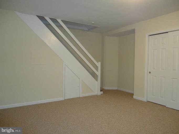 4930 Lindsay Road Baltimore, MD 21229 - Photo 15 of 25 a view of an empty room