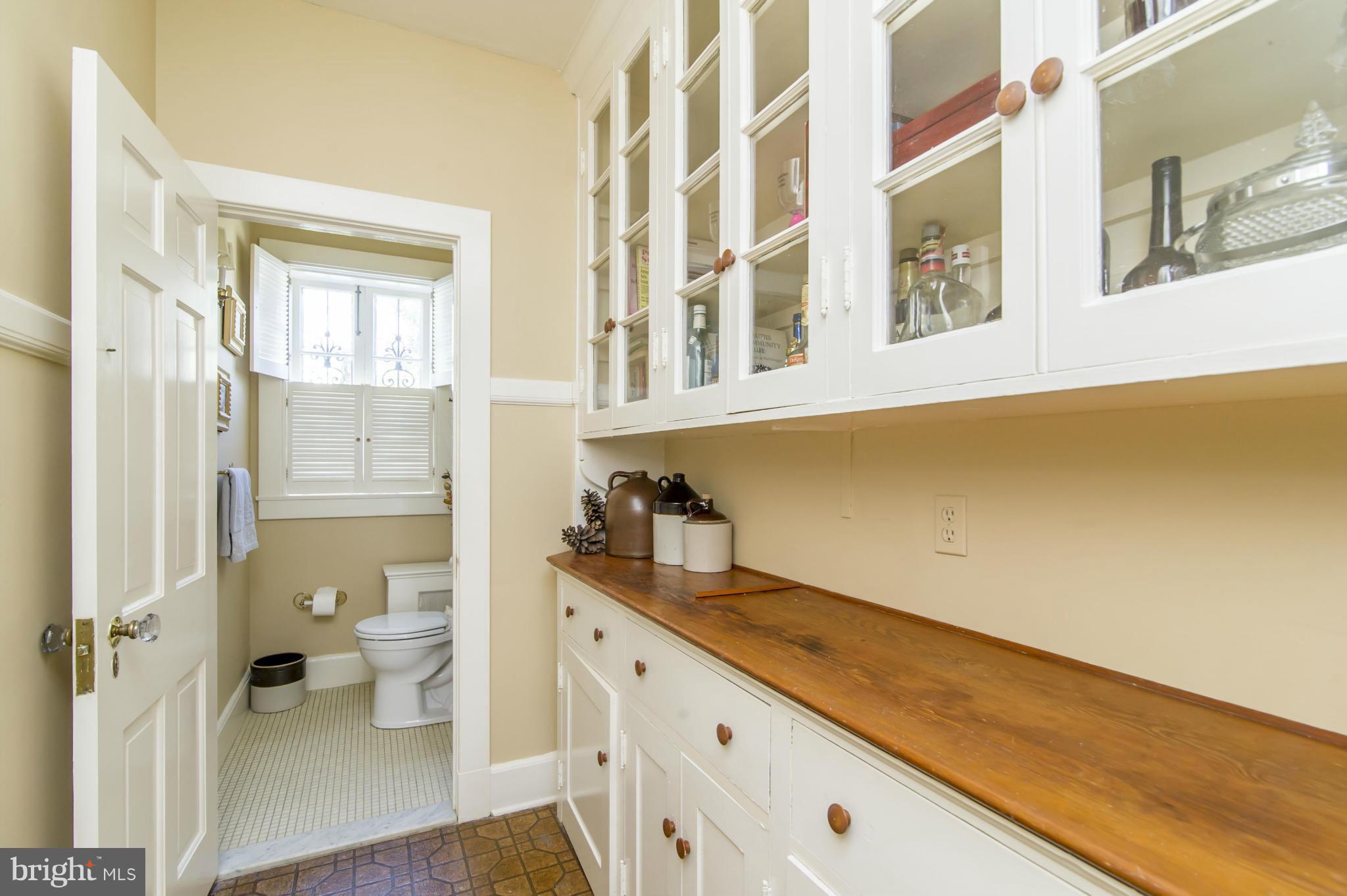 100 Millbrook Road Baltimore, MD 21218 - Photo 12 of 28 Butler's Pantry and Powder Room