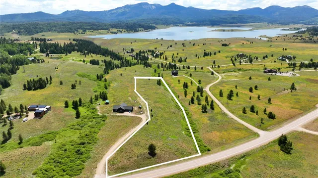 a view of a swimming pool with a lake