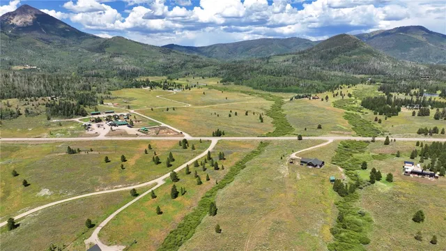a view of a swimming pool with a lake view