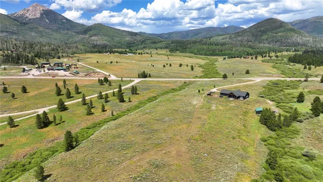 a view of a swimming pool with a lake view