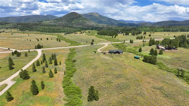 a view of a town with an ocean view