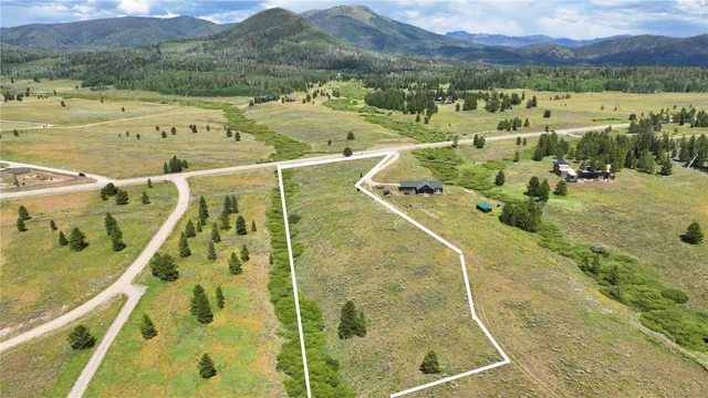a view of a swimming pool with a lake