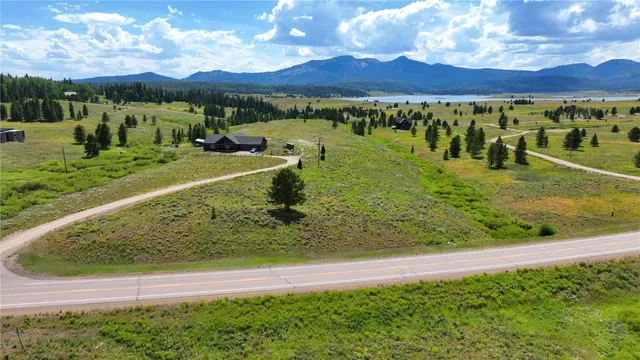 a view of a pathway with a yard