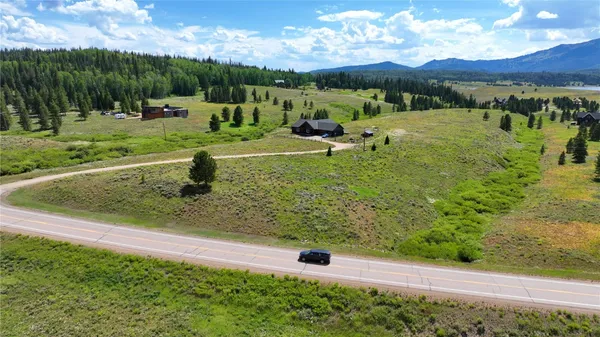 a view of a garden with an outdoor space