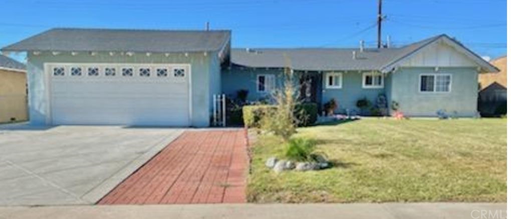 236 North Idyllwild Avenue Rialto, CA 92376 - Photo 1 of 1 a front view of a house with a yard