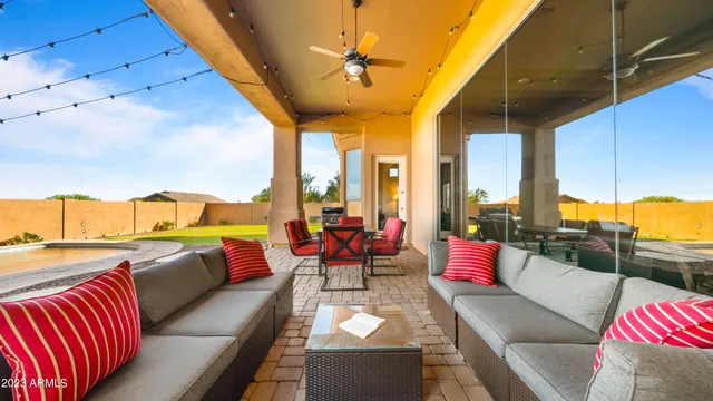 a kitchen with stainless steel appliances granite countertop a stove top oven a sink dishwasher and a stove with granite countertops