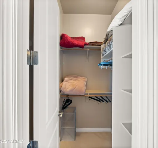 a view of a room with racks on the wall