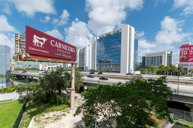 a view of a street with sitting area