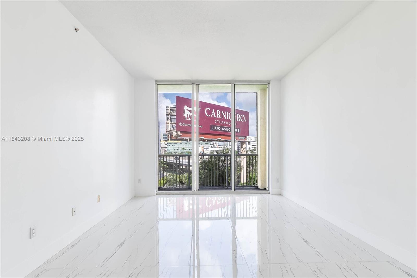 1350 Northwest 8th Court, Unit B5 Miami, FL 33136 - Photo 9 of 21 a view of a room with window