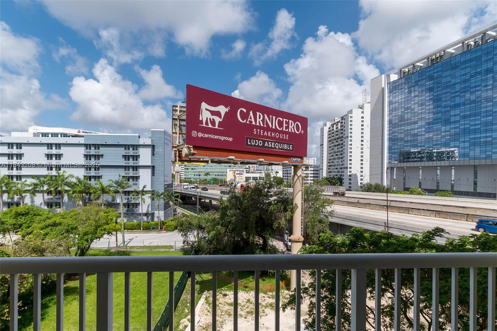 1350 Northwest 8th Court, Unit B5 Miami, FL 33136 - Photo 10 of 21 a sign on the side of a building