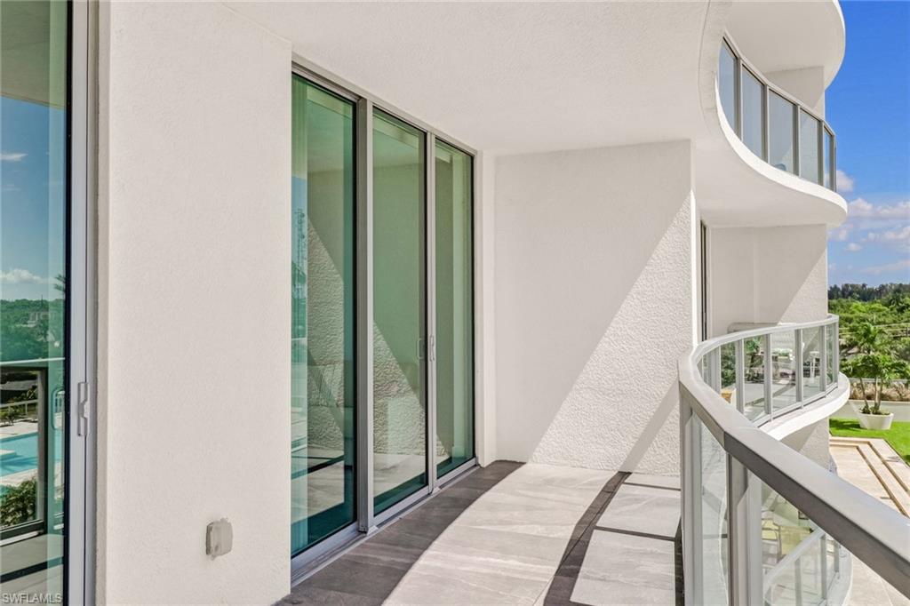 3000 Oasis Grand Boulevard, Unit 606 Fort Myers, FL 33916 - Photo 26 of 47 a view of an entryway with staircase