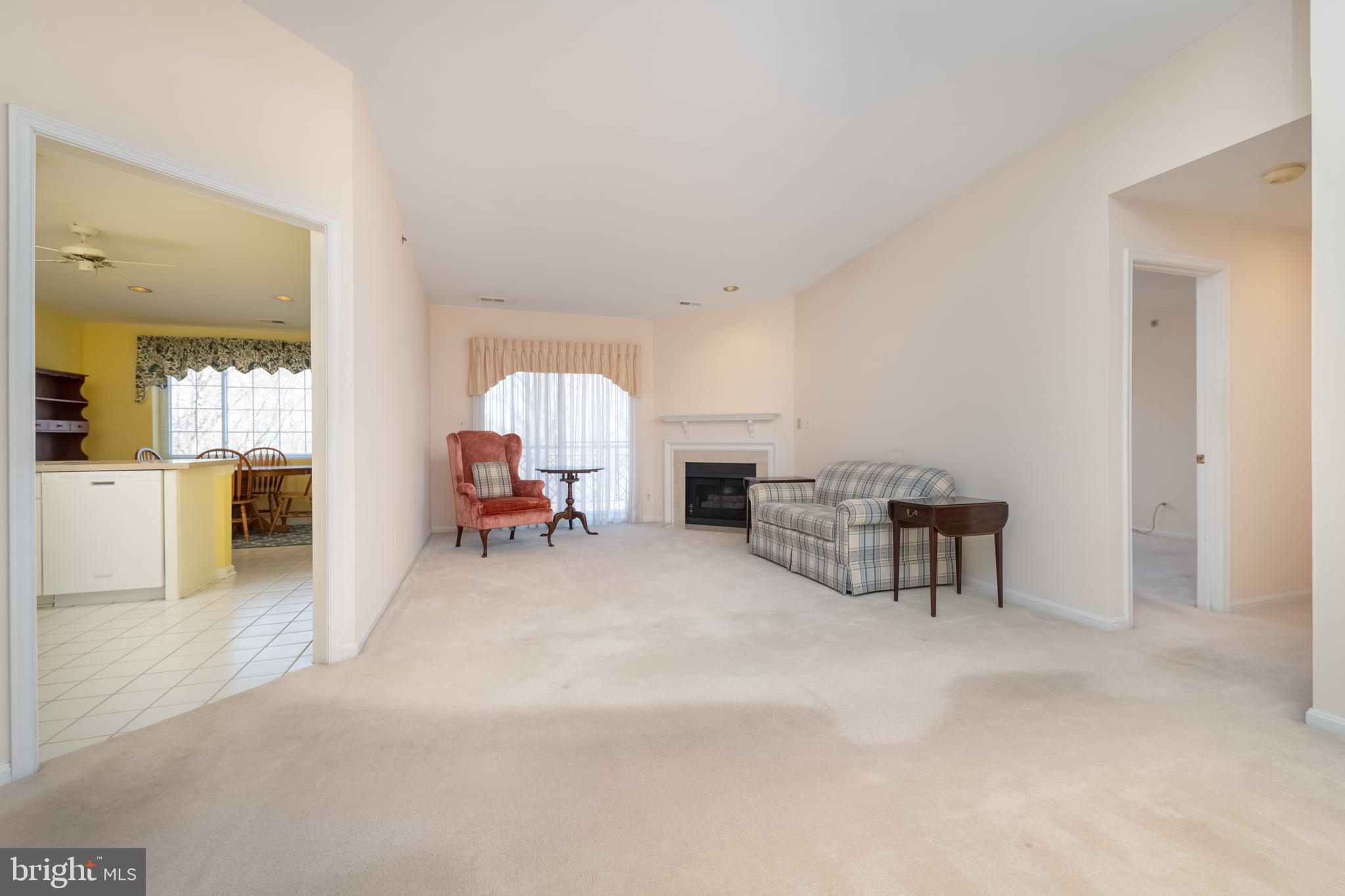 412 Rockfleet Road, Unit 303 Lutherville-Timonium, MD 21093 - Photo 5 of 34 Living Room w/gas fireplace