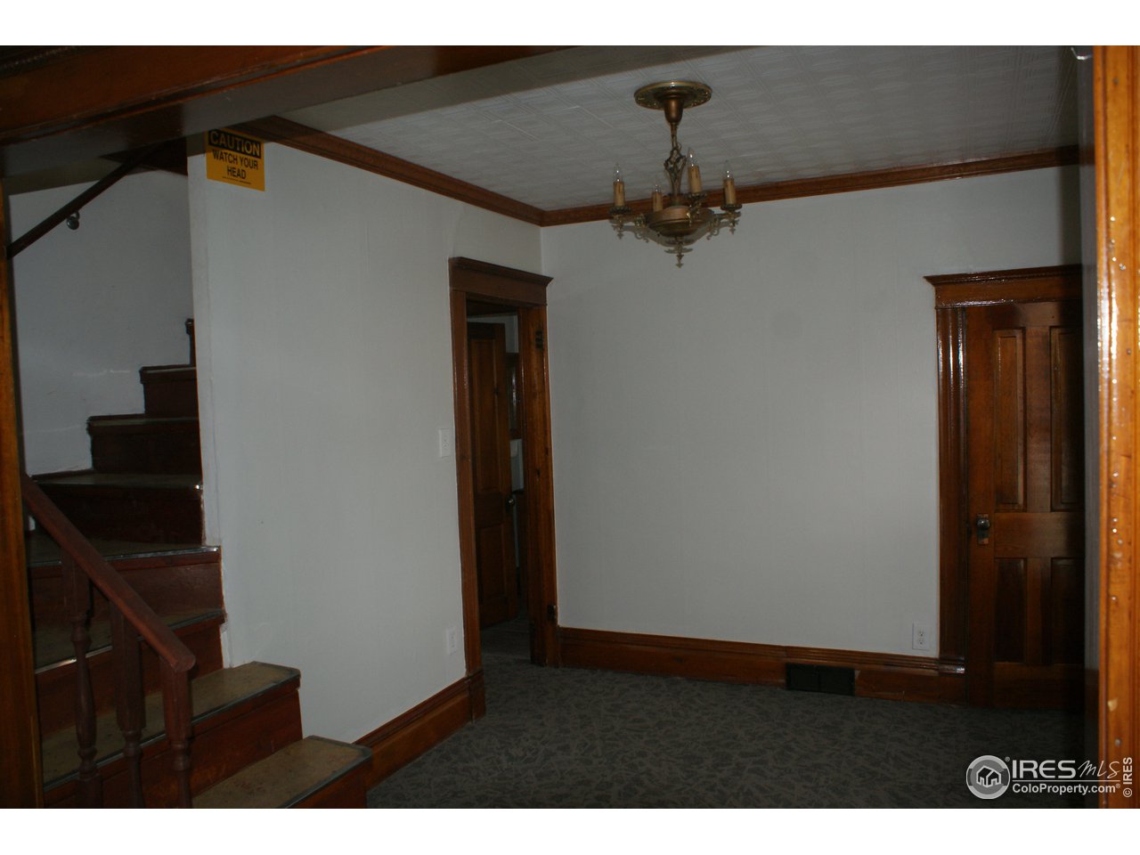 175 South Main Street Brighton, CO 80601 - Photo 8 of 13 a view of hallway with stairs