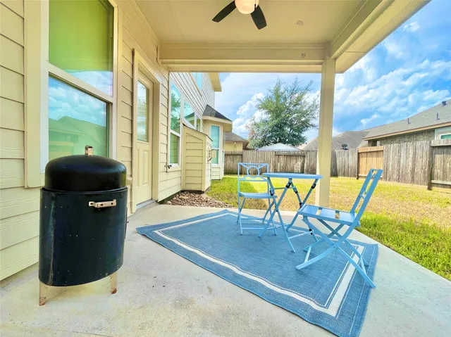 a view of a chairs with a table and chairs