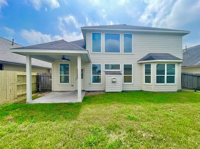 a view of a house with a garden