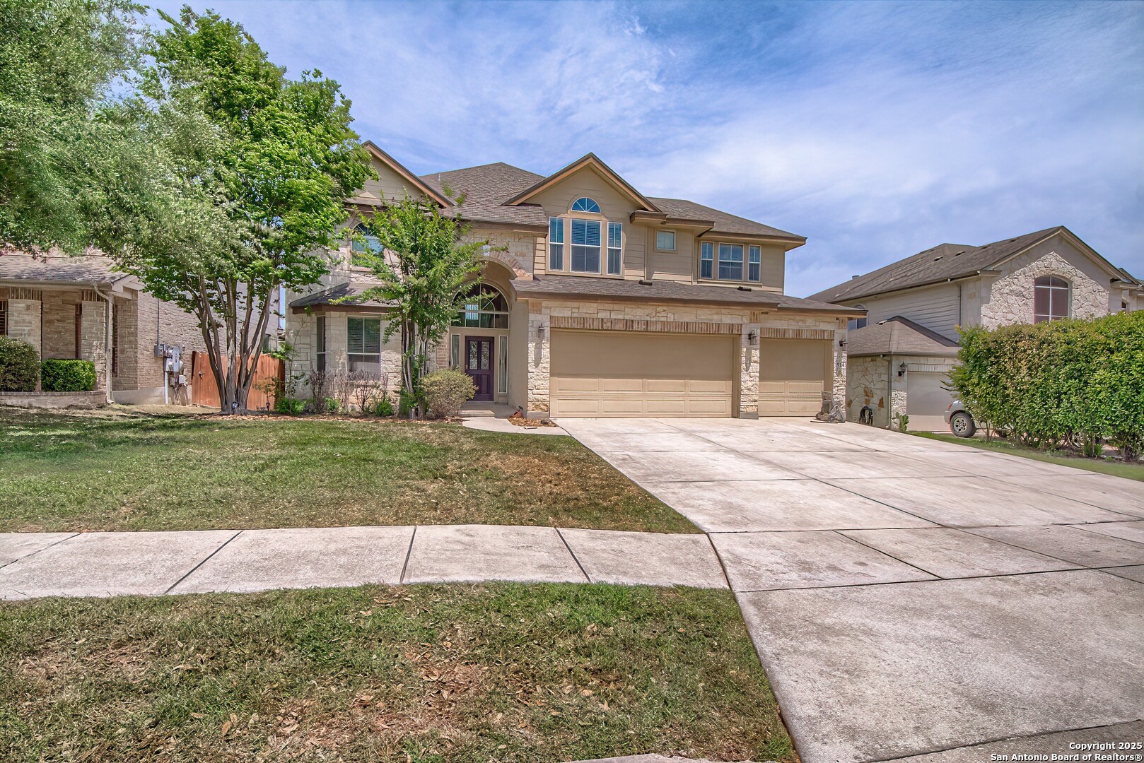 front view of a house with a yard