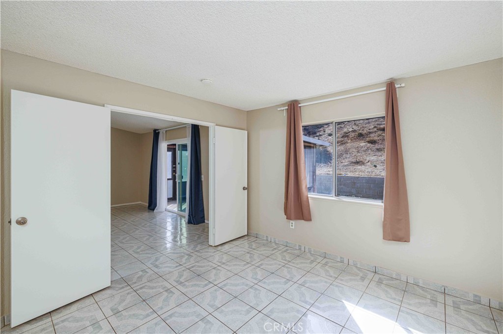 14601 Long View Drive Fontana, CA 92337 - Photo 15 of 33 a view of a big room with windows and closet