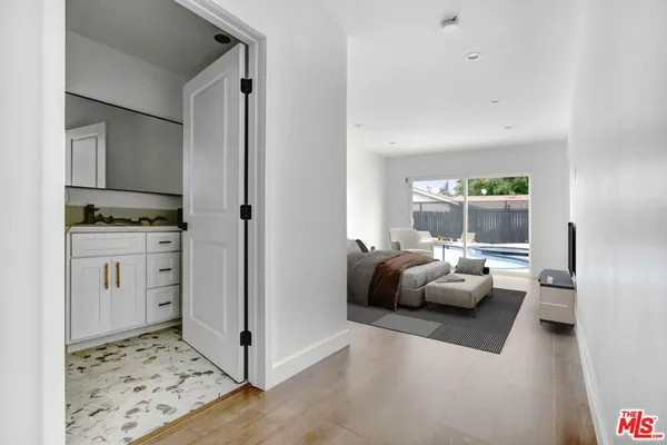 a living room with furniture and a gate