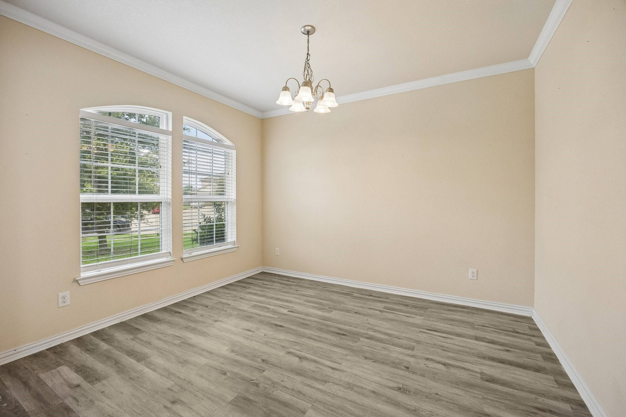 9707 Shimmering Lakes Drive Rosharon, TX 77583 - Photo 6 of 15 wooden floor in an empty room with a window