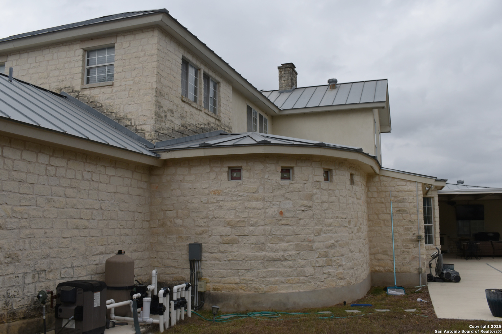 32010 Oak Ridge Parkway Bulverde, TX 78163 - Photo 13 of 48 a front view of a house with many windows