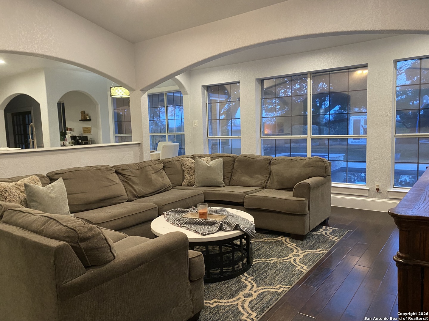 32010 Oak Ridge Parkway Bulverde, TX 78163 - Photo 19 of 48 a living room with furniture and a large window