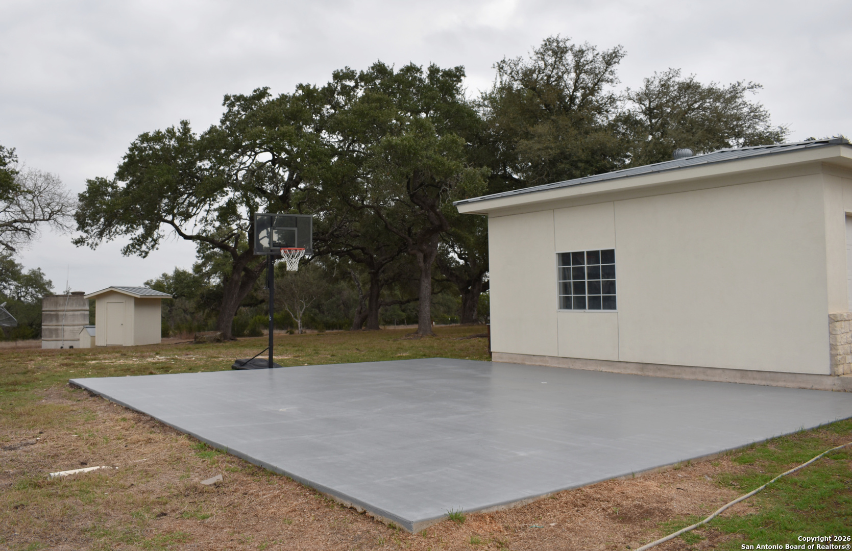 32010 Oak Ridge Parkway Bulverde, TX 78163 - Photo 9 of 48 a view of a backyard space