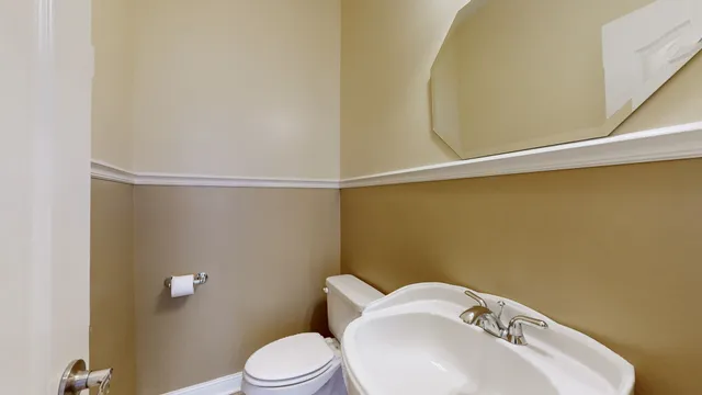 a view of a big room with closet and a fireplace