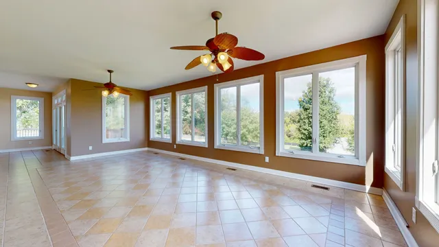 a view of an empty room and window