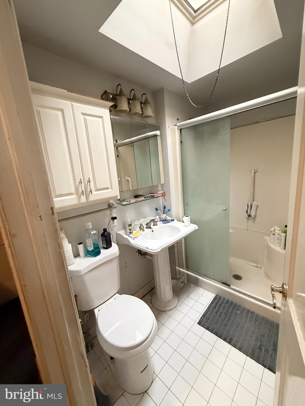 401 North Springfield Road Clifton Heights, PA 19018 - Photo 11 of 14 a bathroom with a sink toilet and shower