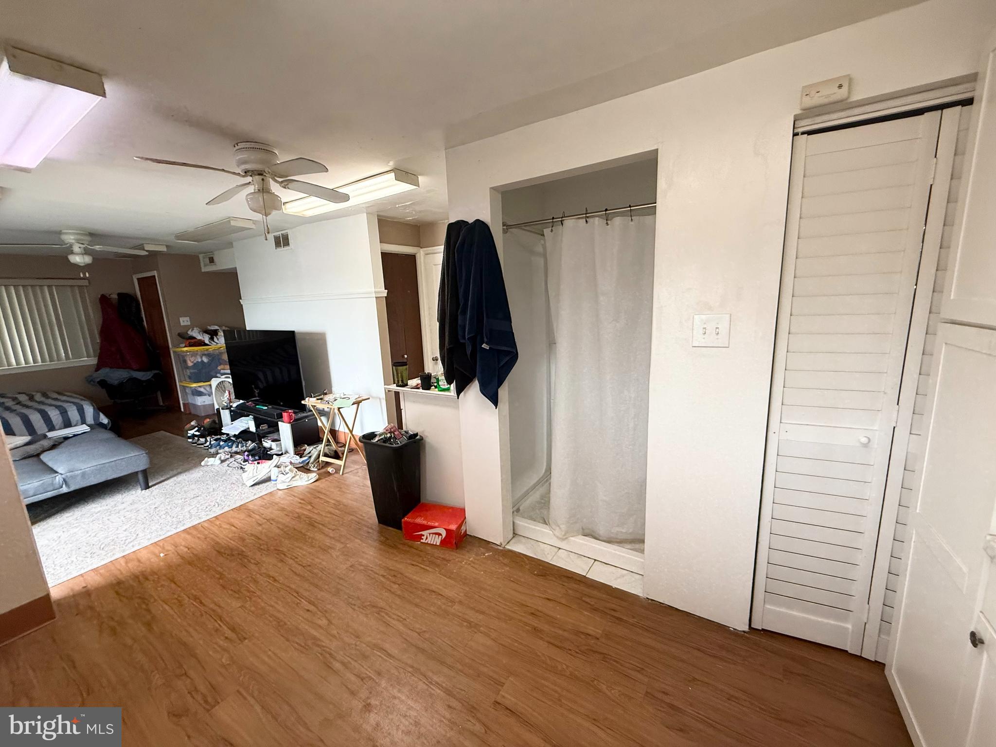 401 North Springfield Road Clifton Heights, PA 19018 - Photo 5 of 14 a view of a livingroom with furniture and a flat screen tv