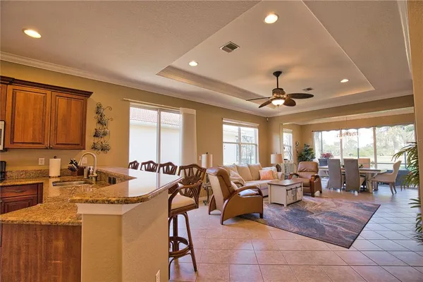 a very nice looking living room with a large window