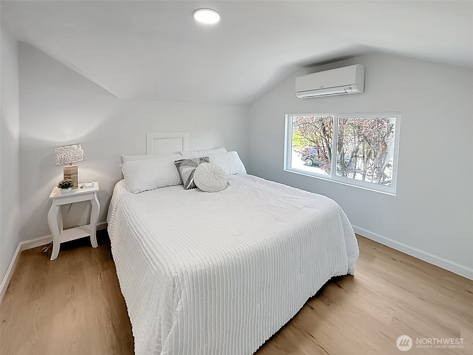 7403 Beverly Boulevard Everett, WA 98203 - Photo 13 of 19 a bedroom with a bed and a window