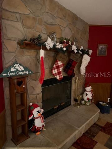 13921 Pine Meadow Road Kathleen, FL 33849 - Photo 12 of 25 a room filled with furniture and a couch