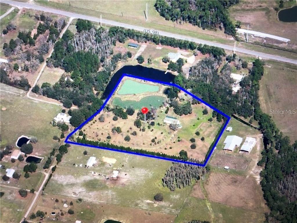 13921 Pine Meadow Road Kathleen, FL 33849 - Photo 6 of 25 a view of a tennis court