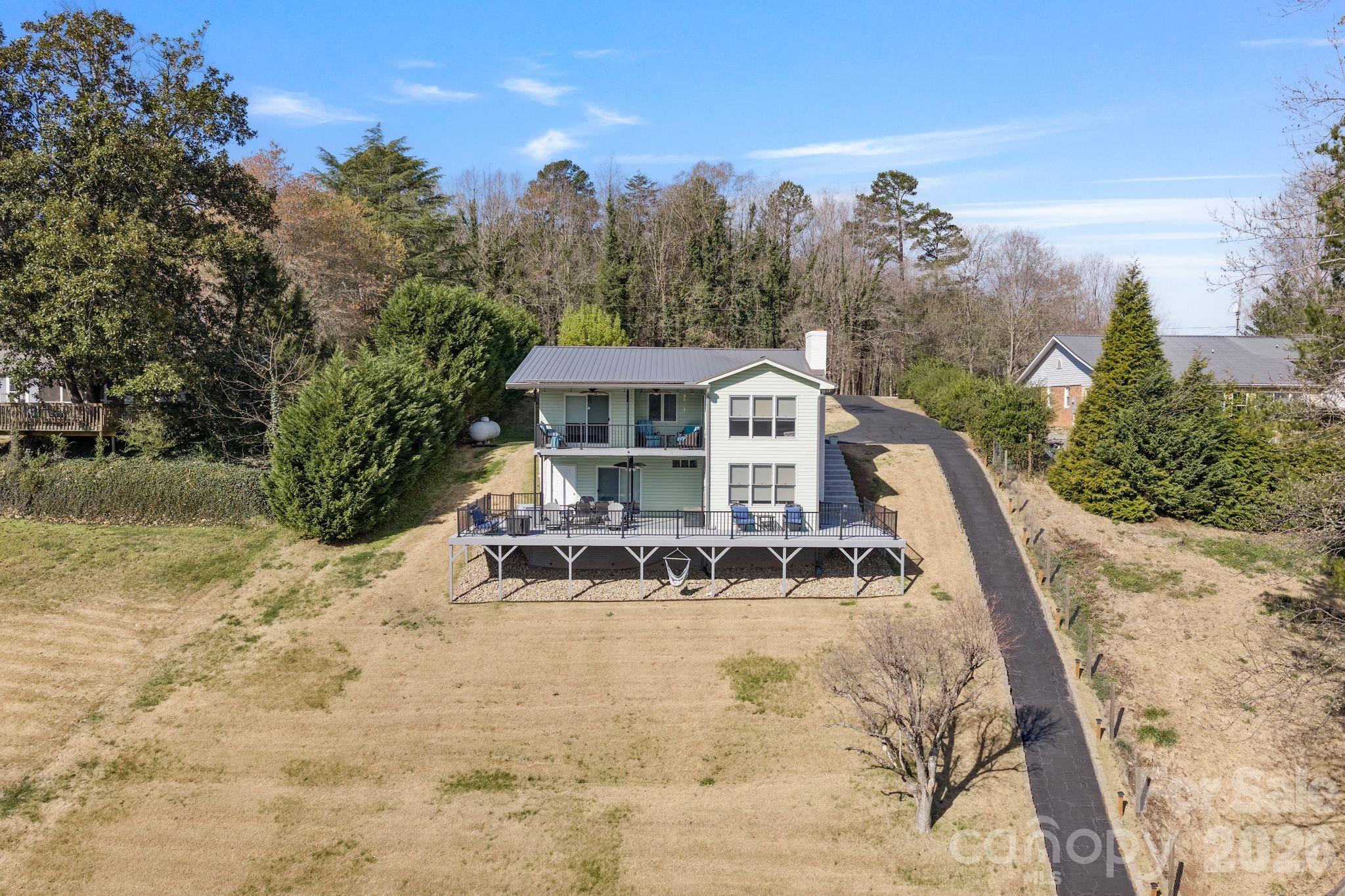 6234 Ruffin Lane Conover, NC 28613 - Photo 3 of 48 a view of a house with pool and sitting area